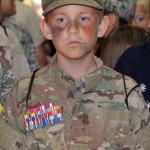 Jr. Raptor waits for a mock deployment April 12 at Tyndall’s Hangar 5. More than 100 military children attended the Jr. Raptor. (U.S. Air Force photo by Airman 1st Class Solomon Cook)